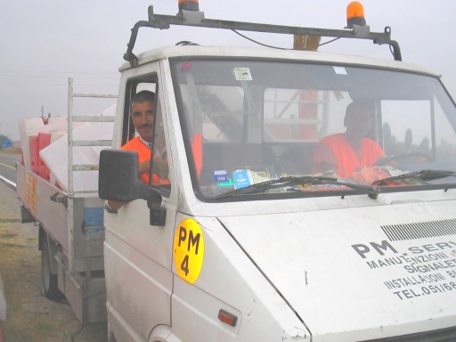 Il camion della PM service, a destra della guida Tansoui Ahmed